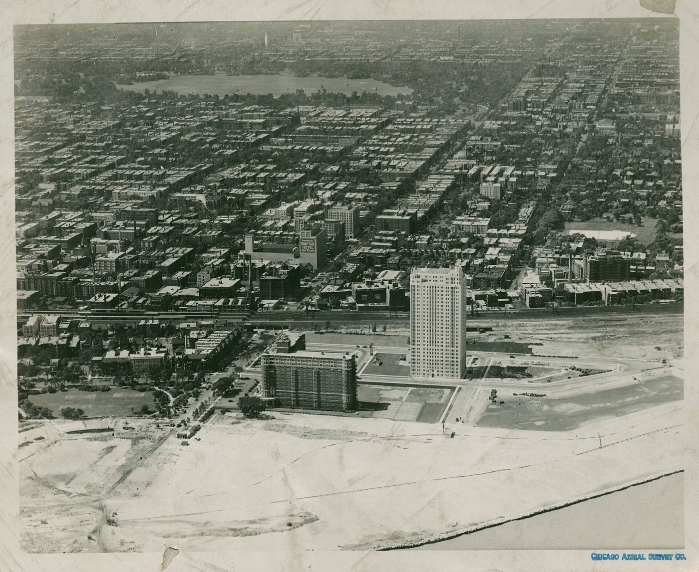 Aerial photograph of Hyde Park and the lakefront taken by the Chicago Aerial Survey Company in 1928